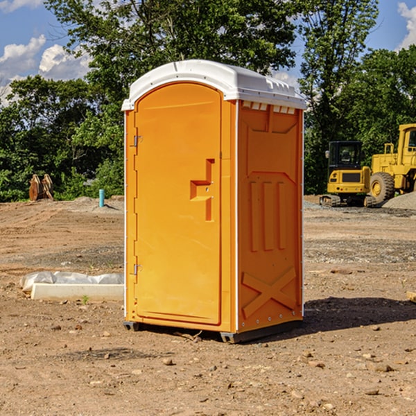 how often are the porta potties cleaned and serviced during a rental period in Almedia